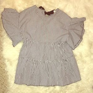 Black and white checkered blouse